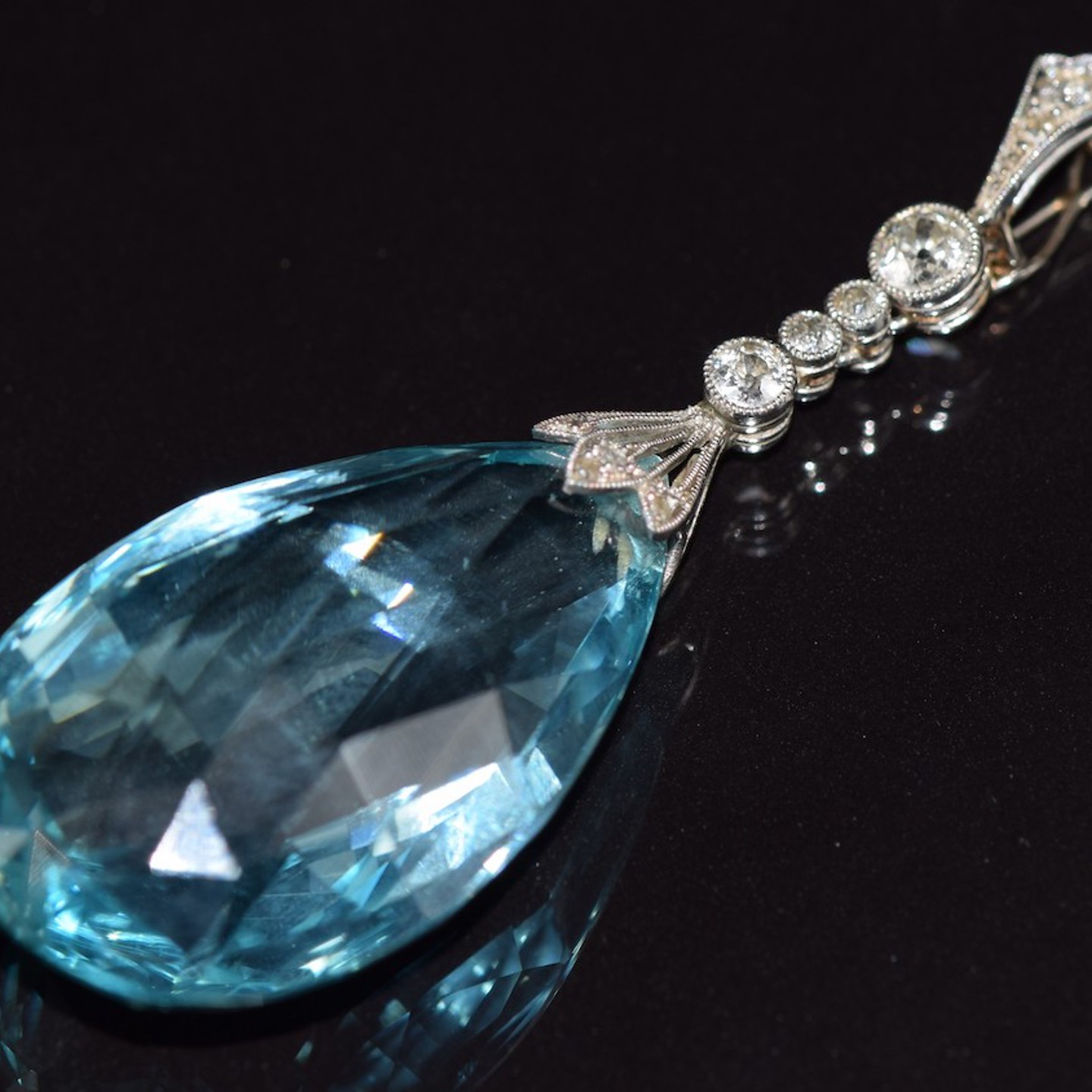 Art Deco Platinum Pendant Set With A Briolette Cut Aquamarine And Old Cut Diamonds. Sold For £7000