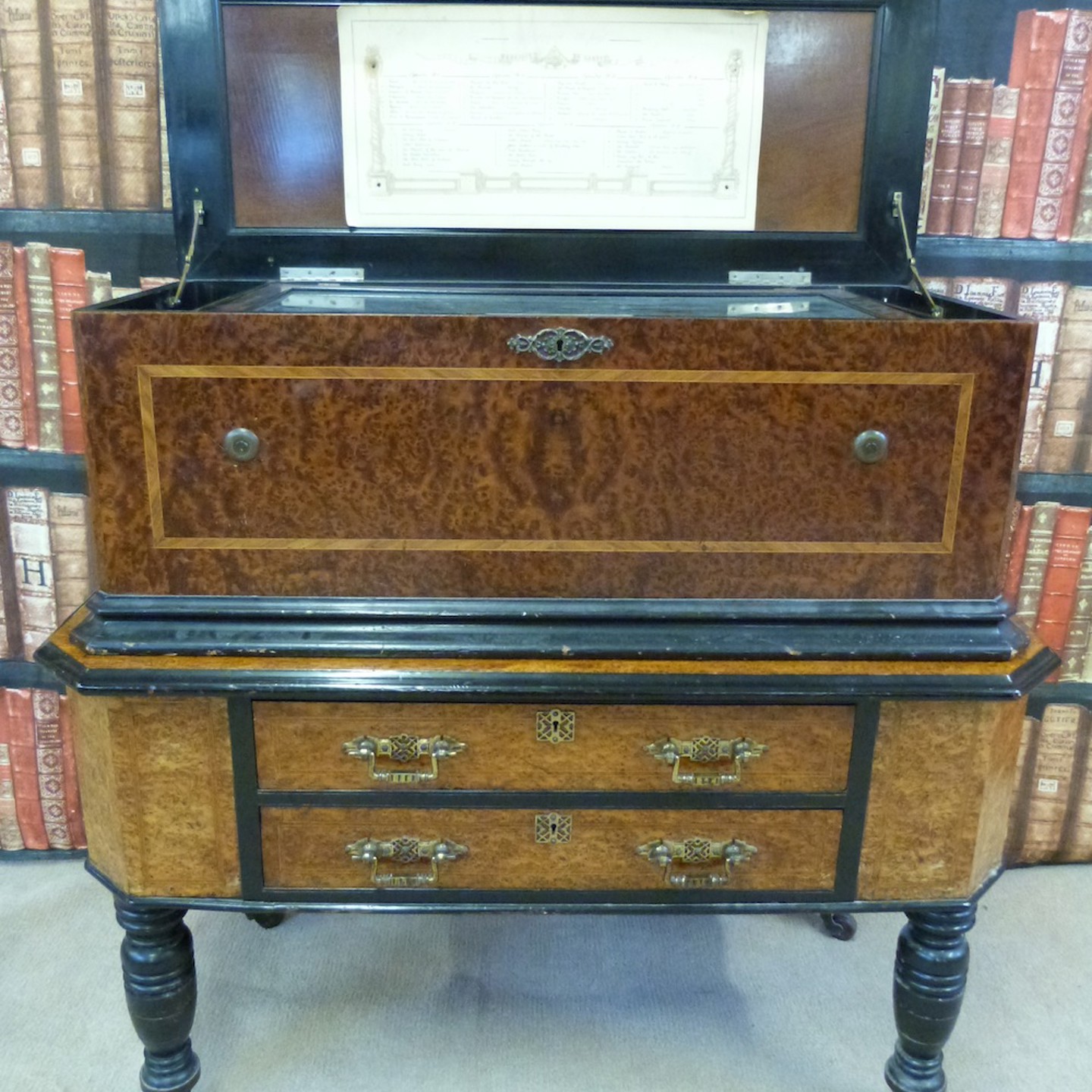 A 19Thc Interchangeable Orchestral Cylinder Musical Box In Burr Walnut Case With Banding To The Lid And Sides, Mounted On A Matching Table Sold Ś6,000