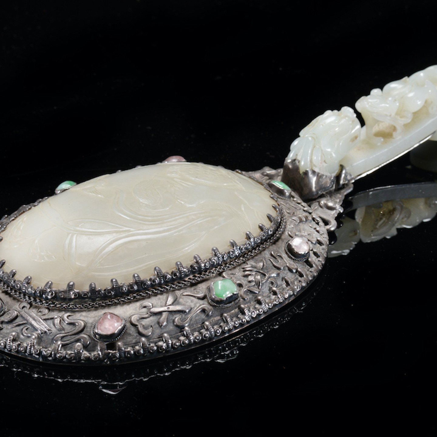 A 19Thc Chinese Mirror, The Handle A Celadon Jade Belt Hook Carved With Dragon And Lizard Decoration. Sold For £3,600